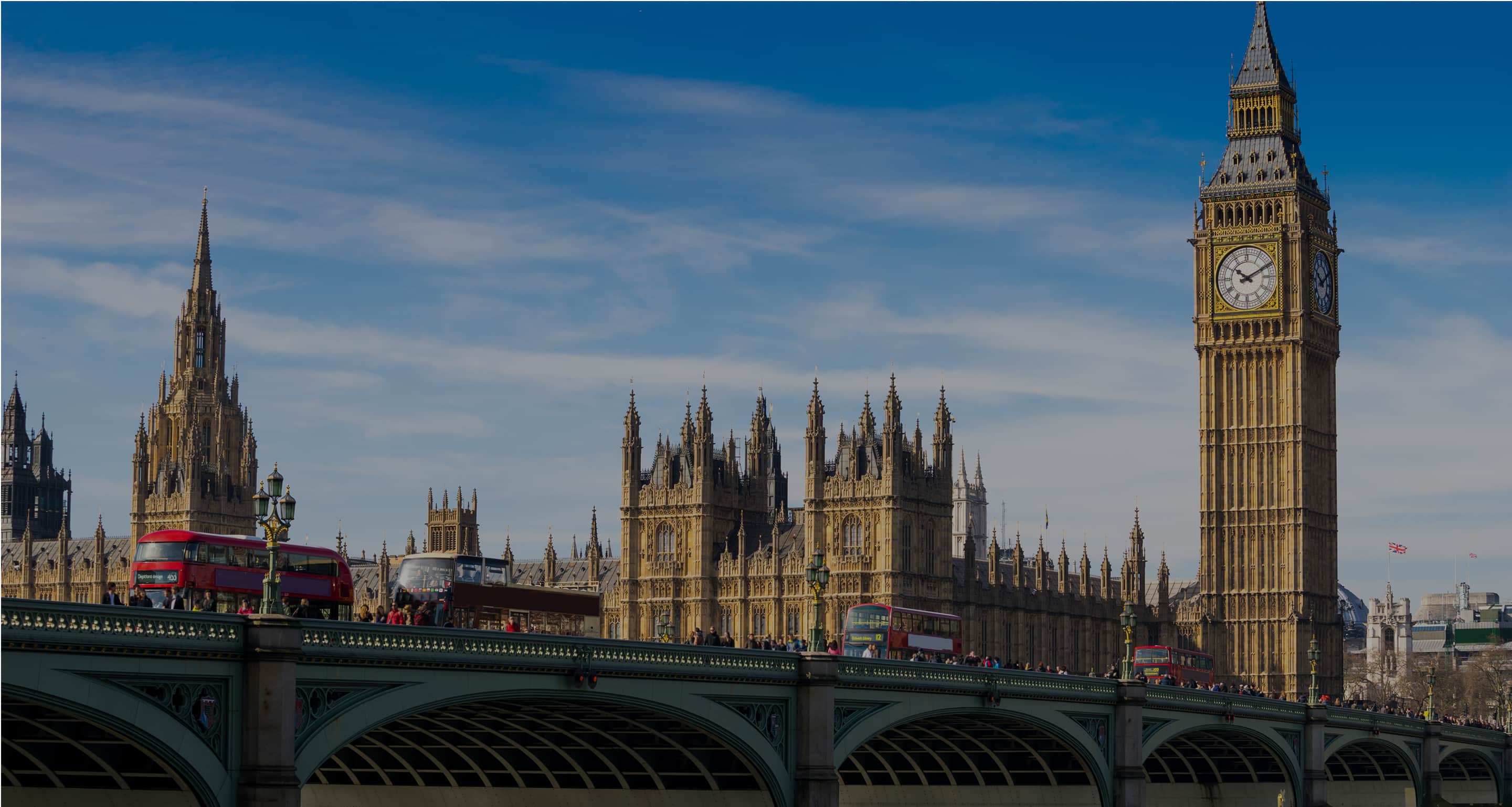 Big Ben and Westminster Bridge with buses