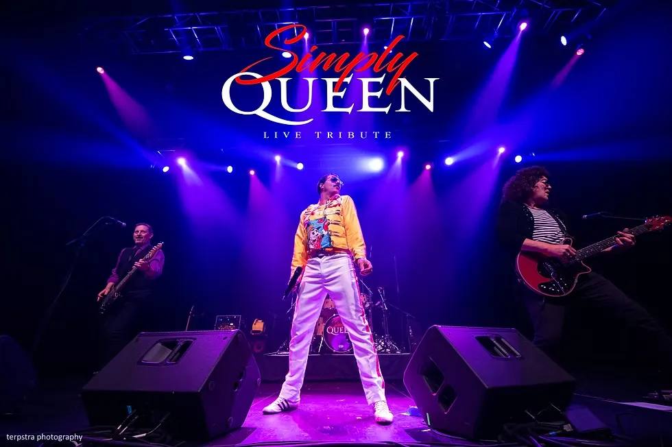 Simply Queen tribute band performing live on stage.