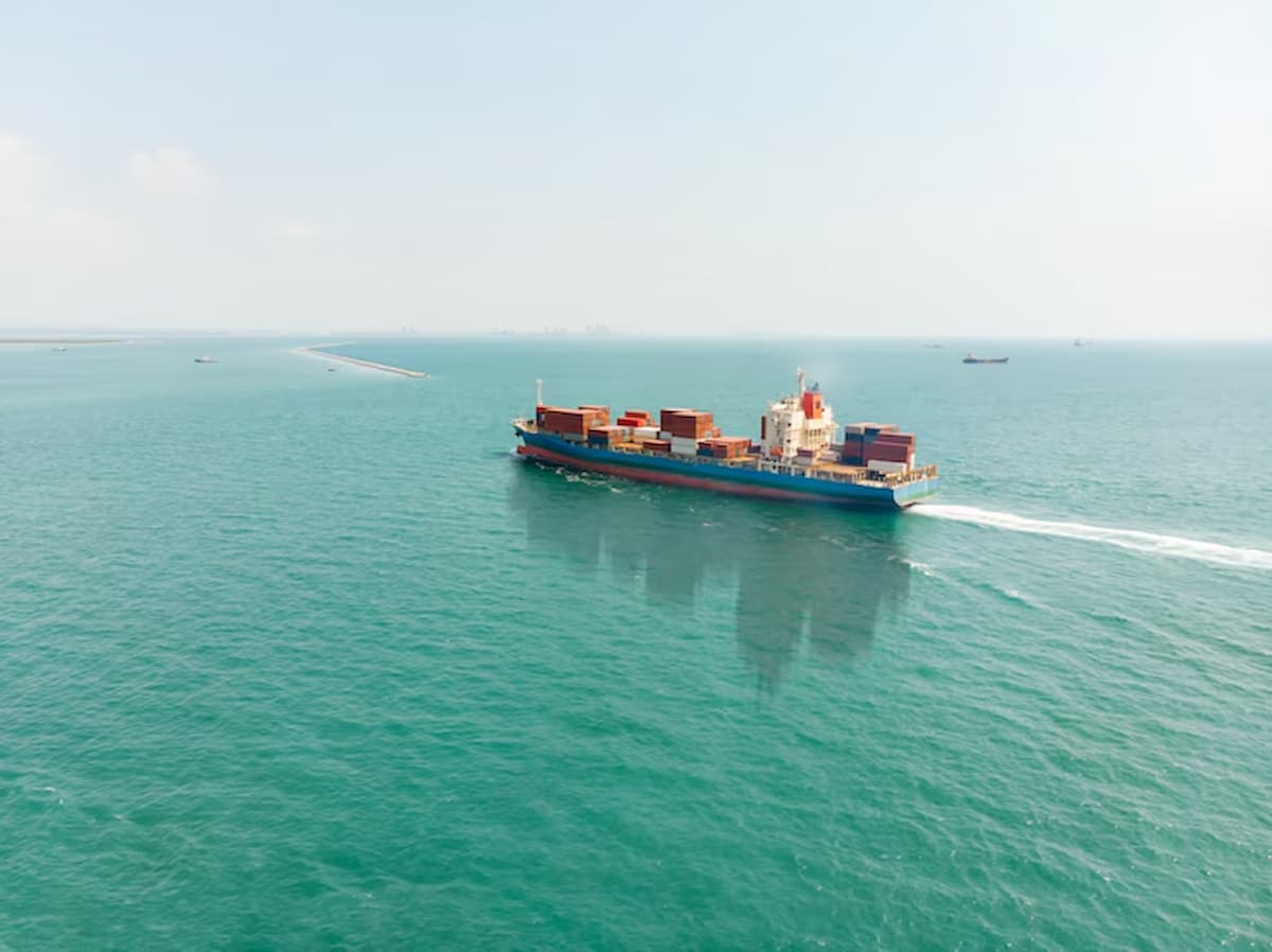 Cargo ship sailing in open sea