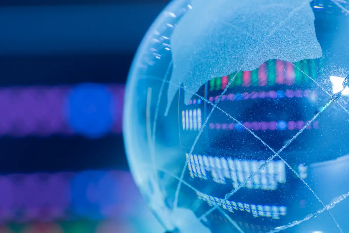 Globe with digital data overlay in background